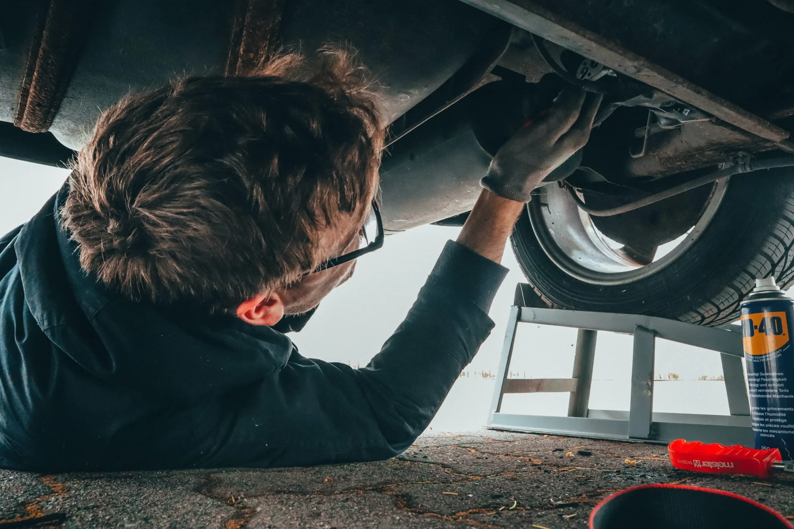 service technician working on car